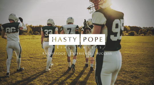 football players walking away after practice